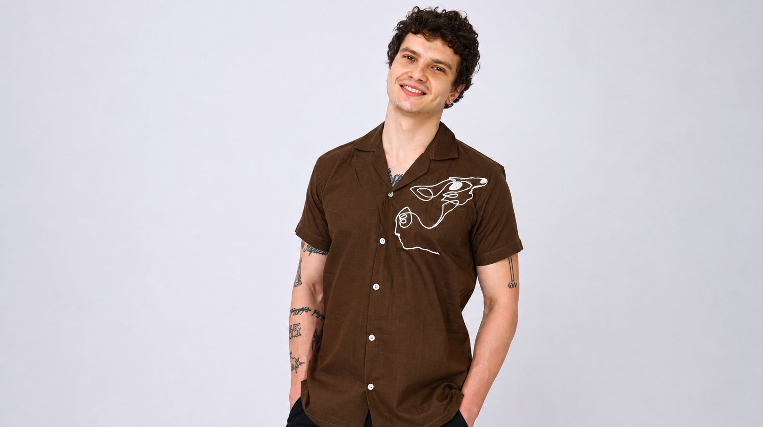 Artistic Resort Style with a Brown Embroidered Shirt
